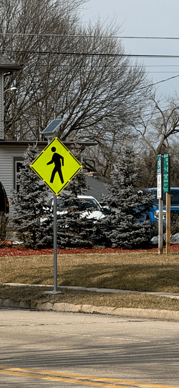 flashing pedestrian crossing sign with LED lights