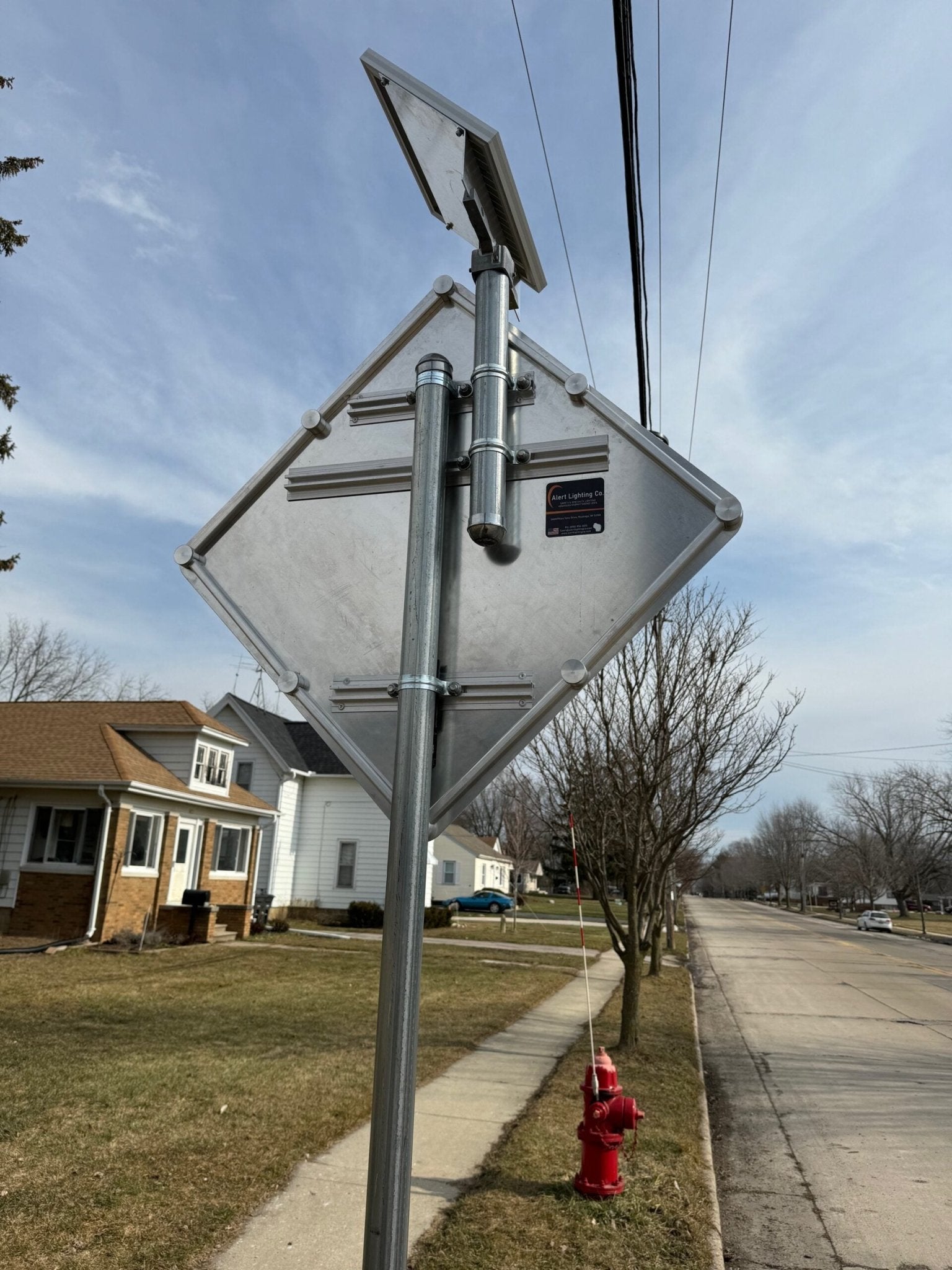 Installed LED pedestrian crosswalk sign with flashing safety lights